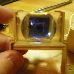 Through-lens optical sensor