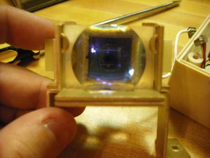 Through-lens optical sensor